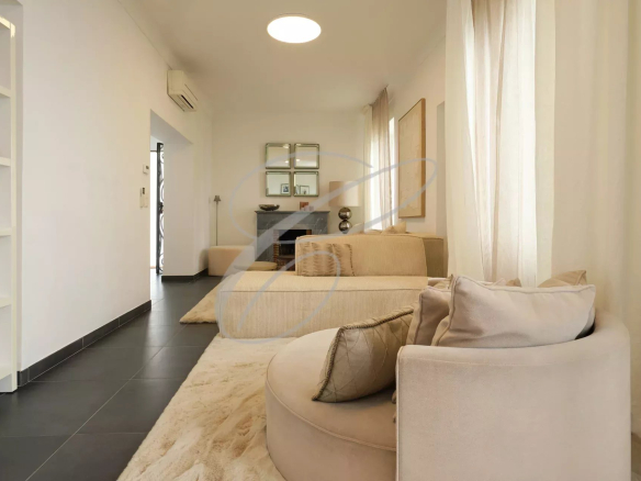 Interior of a villa in Roquebrune-Cap-Martin with a modern and bright living room.