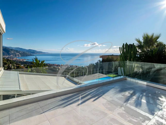 Panoramic sea view from a modern villa terrace in Roquebrune-Cap-Martin.