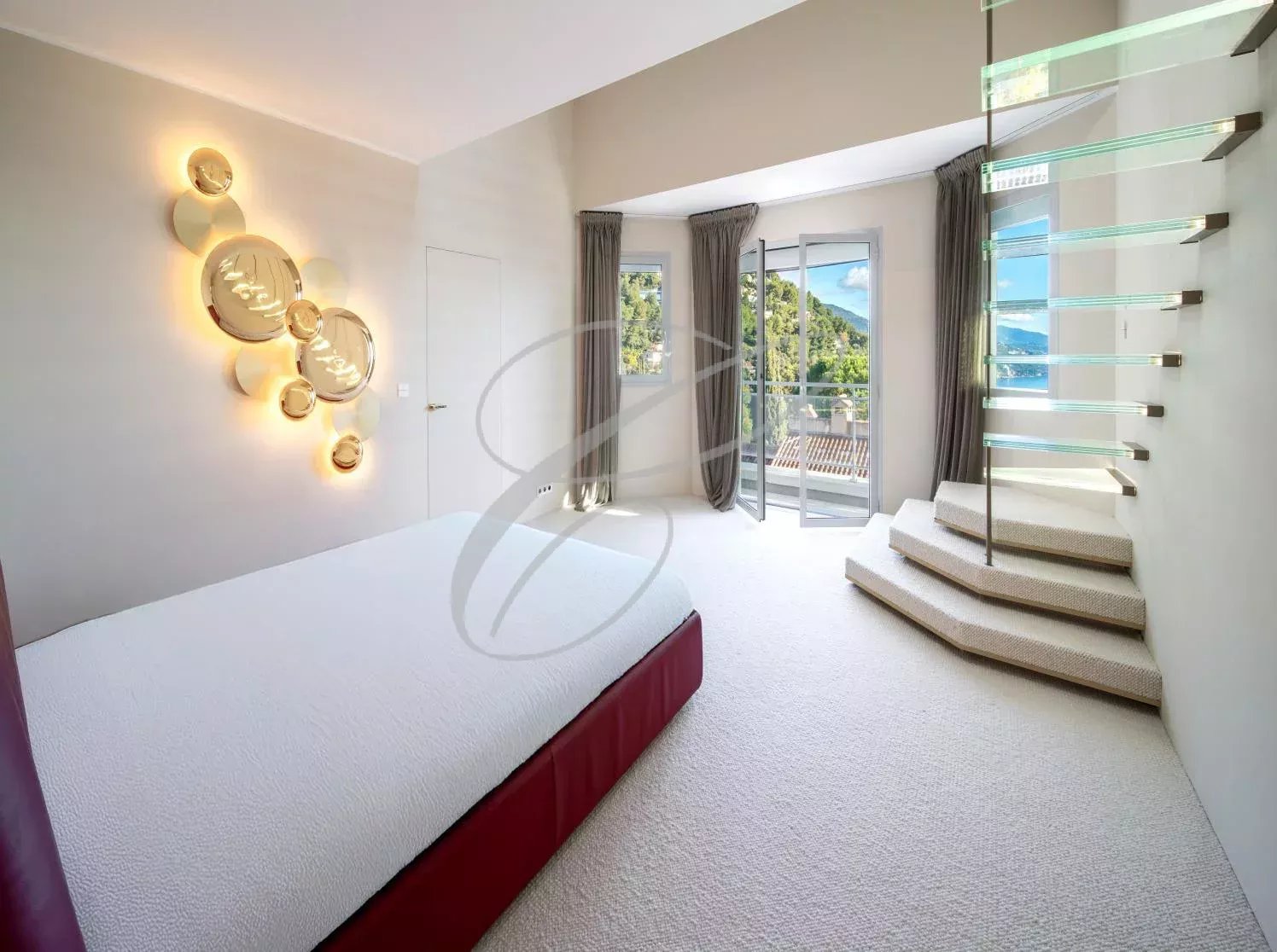 Modern villa room Room in a modern villa with a glass staircase and a view of nature.