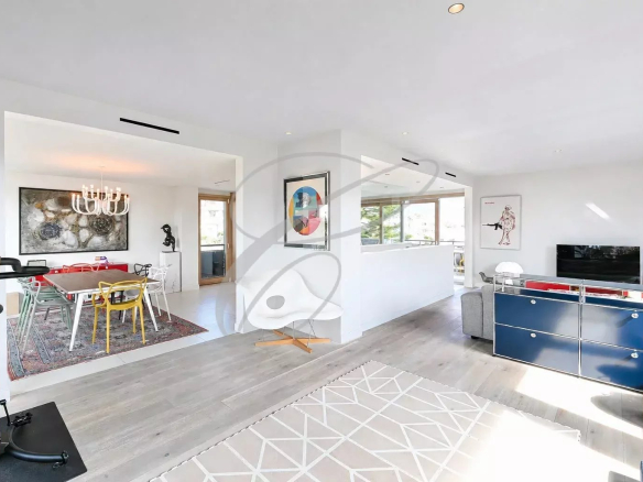 Interior of a renovated villa in Roquebrune-Cap-Martin, with modern living room and dining room.