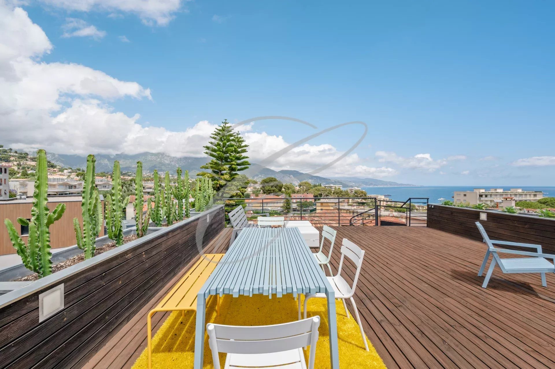 Wooden terrace with views of the sea and cacti, Roquebrune-Cap-Martin.