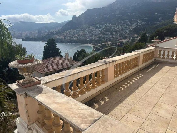 Terrace of a property in Roquebrune-Cap-Martin with views of the bay of Monaco and the surrounding mountains.