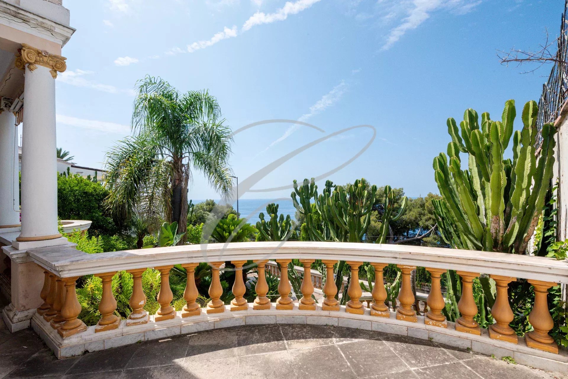 Terrace with a view in Roquebrune-Cap-Martin Terrace of a villa with sea views and exotic plants in Roquebrune-Cap-Martin.