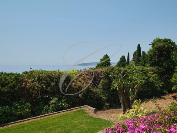 Sea view from a garden with exotic plants in Menton Garavan.
