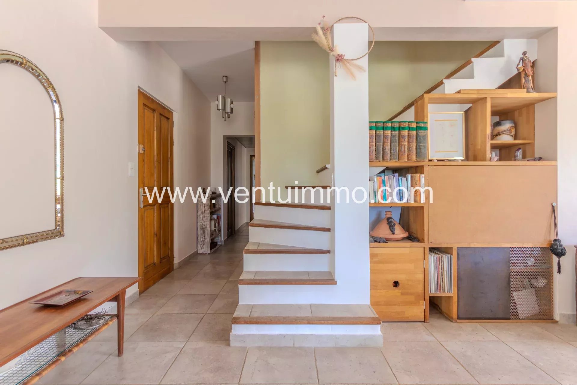 Interior of a wine estate Interior of a house with staircase and storage, La Garde-Freinet.