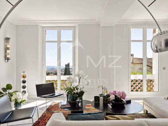 Interior of a renovated villa with sea views, bright and modern living room in Le Cannet.