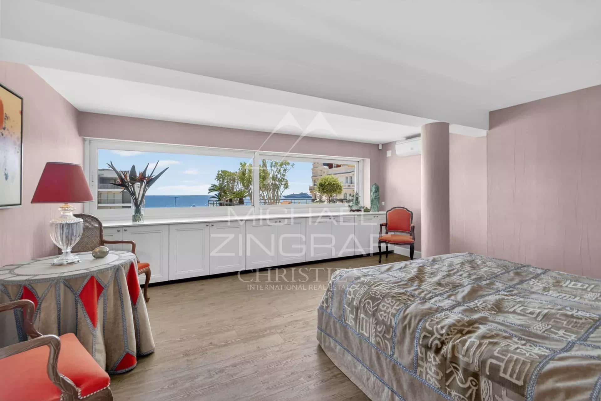 Apartment room in Cannes with sea view and elegant furnishings.
