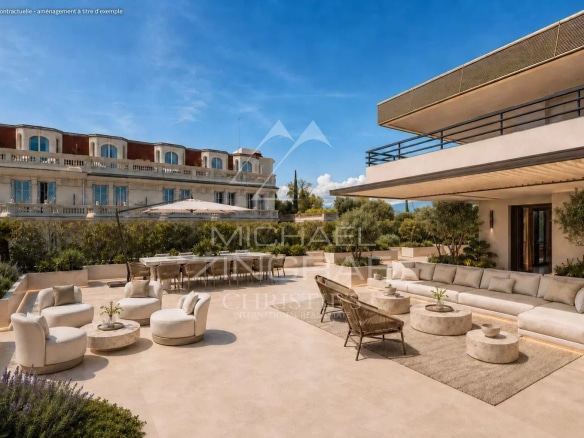 Terrace of a penthouse in Cannes with modern furniture and unobstructed view.