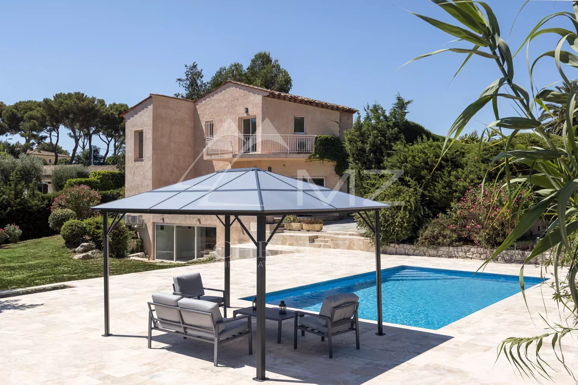Renovated family property with swimming pool and relaxation area in the hills above Cannes.