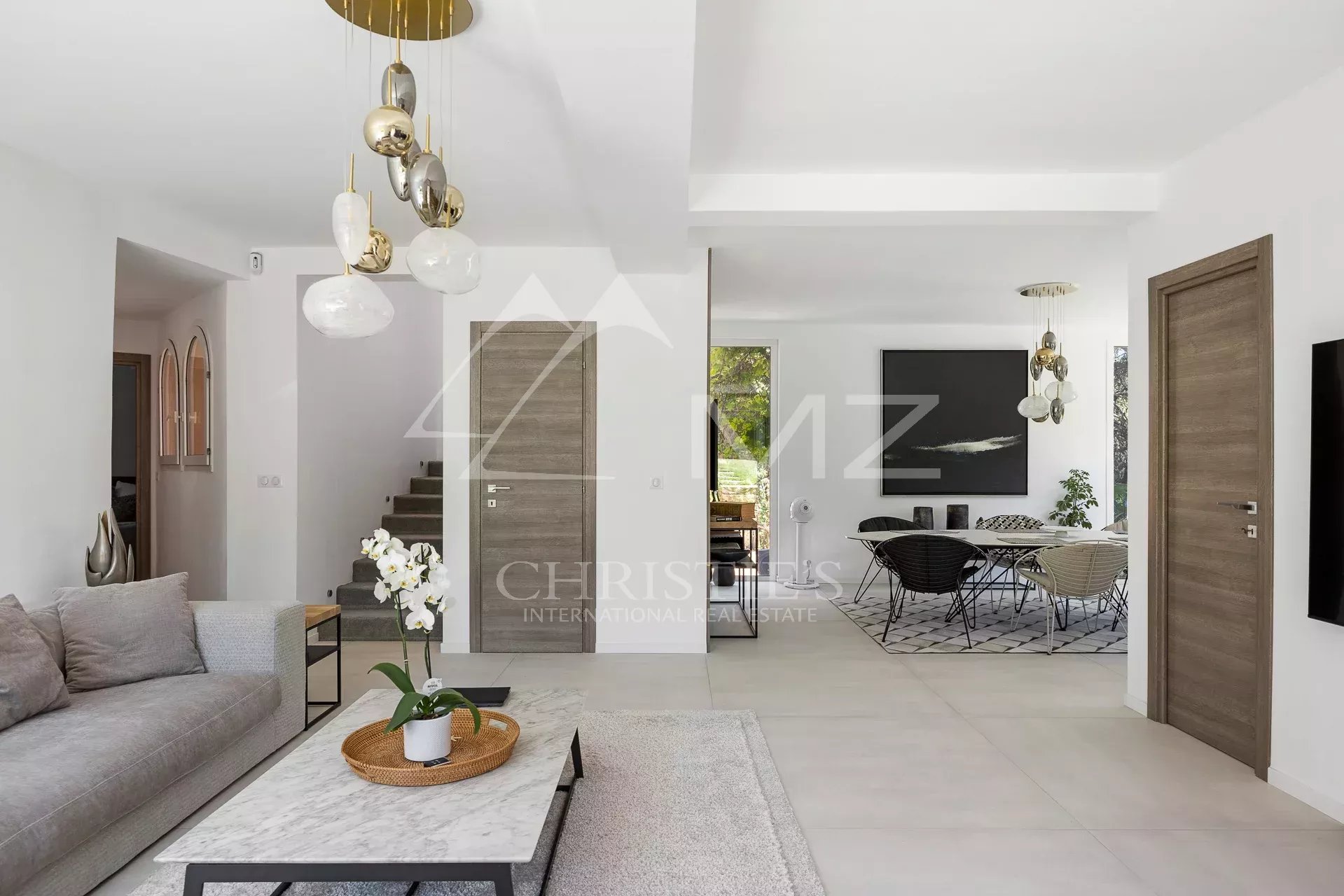 Interior of a renovated family property with a modern living room and contemporary decor.