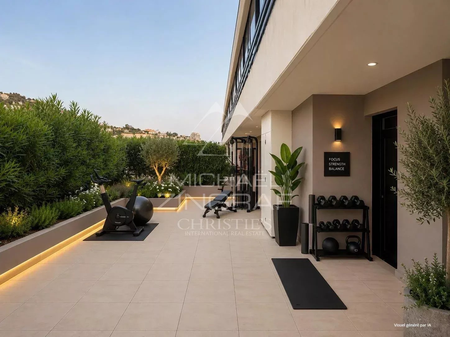 Spacious terrace of an apartment in Cannes with fitness equipment and unobstructed views.