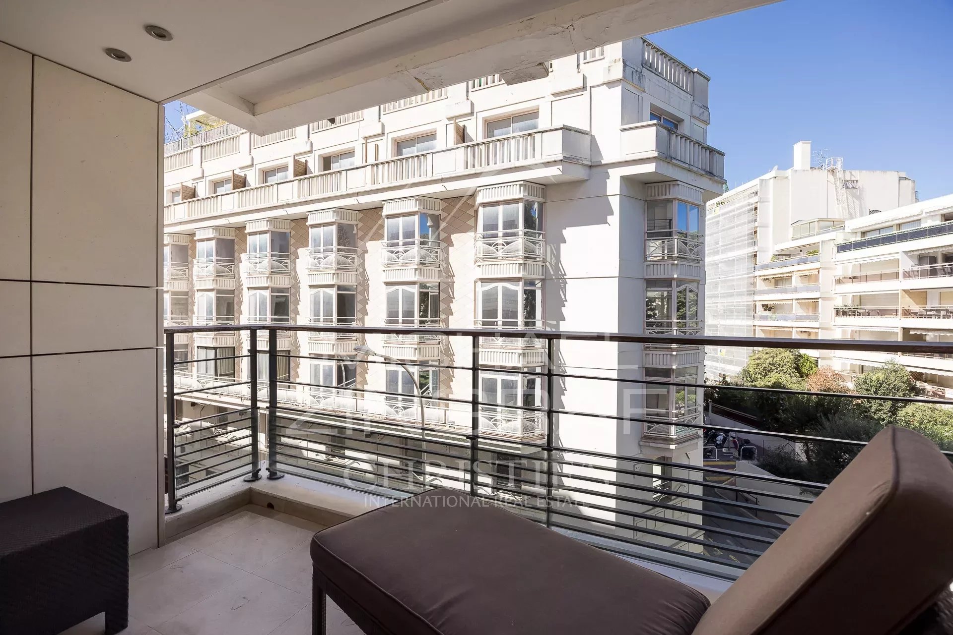 Apartment terrace in Cannes Terrace of an apartment in Cannes with views of surrounding buildings.