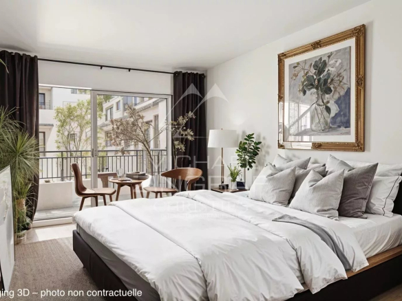 Chambre d'un appartement 4 pièces à Cannes, avec lit double et accès à une terrasse.