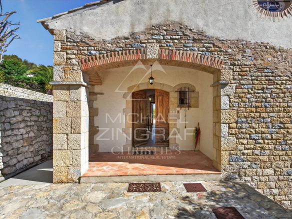 Entrance to a stone villa with sea views in Vallauris