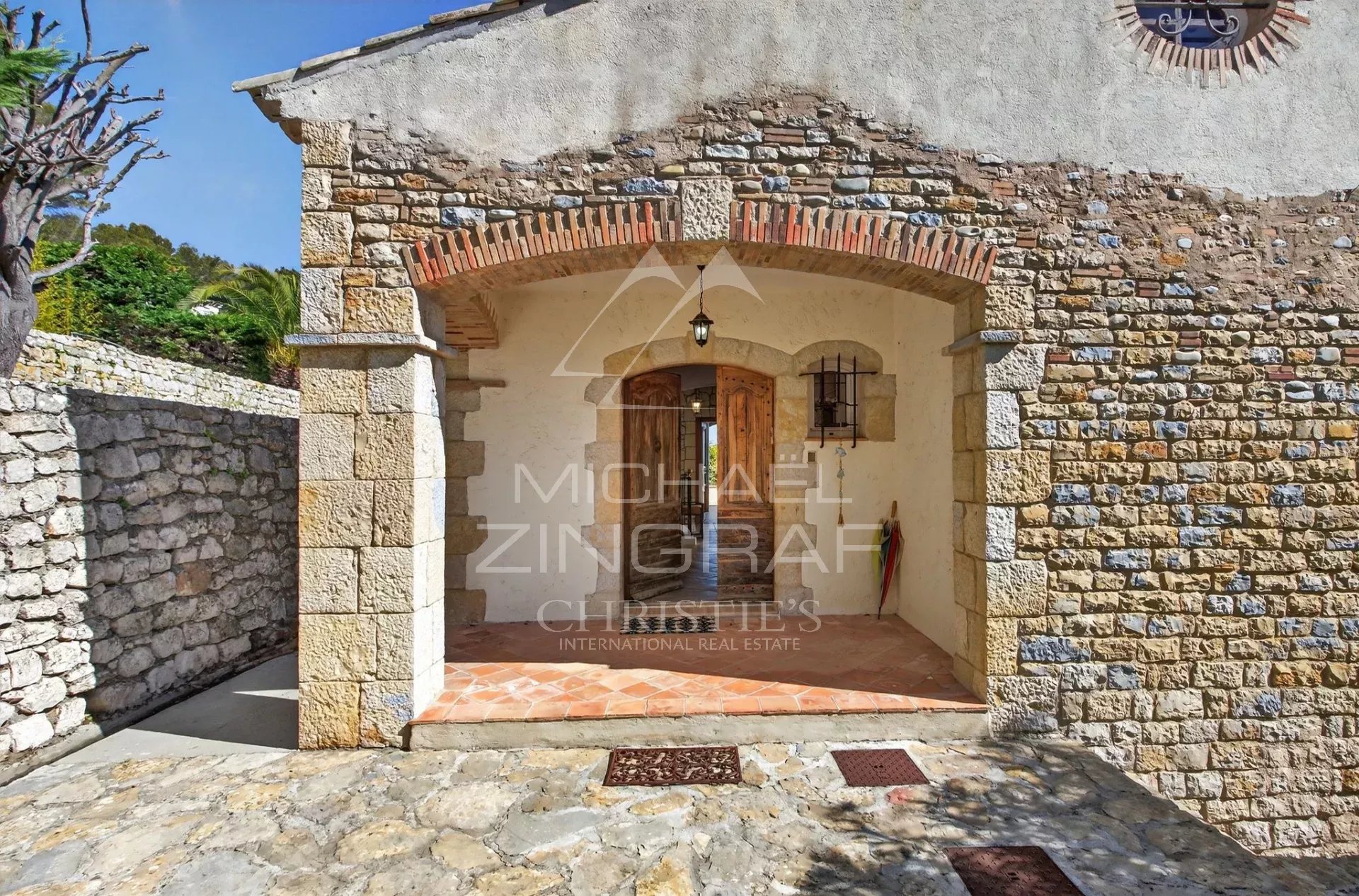 Entrance to a stone villa in Vallauris Entrance to a stone villa with sea views in Vallauris