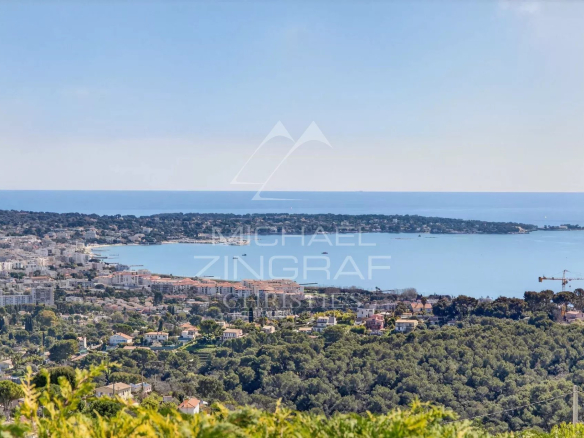 Panoramic view of the sea and Cap d'Antibes from a villa in Vallauris.