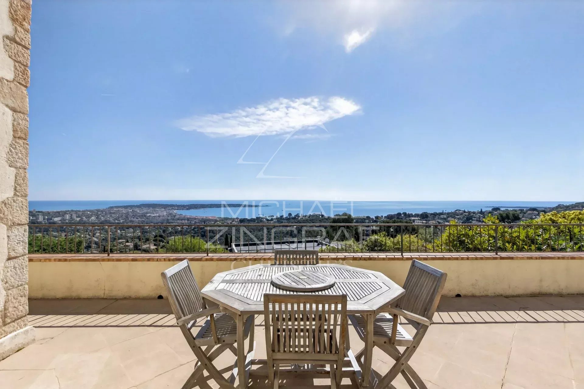 Stone villa with sea view in Vallauris Terrace of a stone villa with panoramic views of the sea and surrounding landscape in Vallauris.