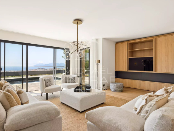 Interior of a contemporary villa in Cannes with sea views, bright and modern living room.