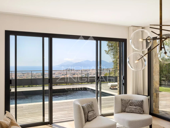 Interior of a contemporary villa in Cannes with views of the sea and the city.