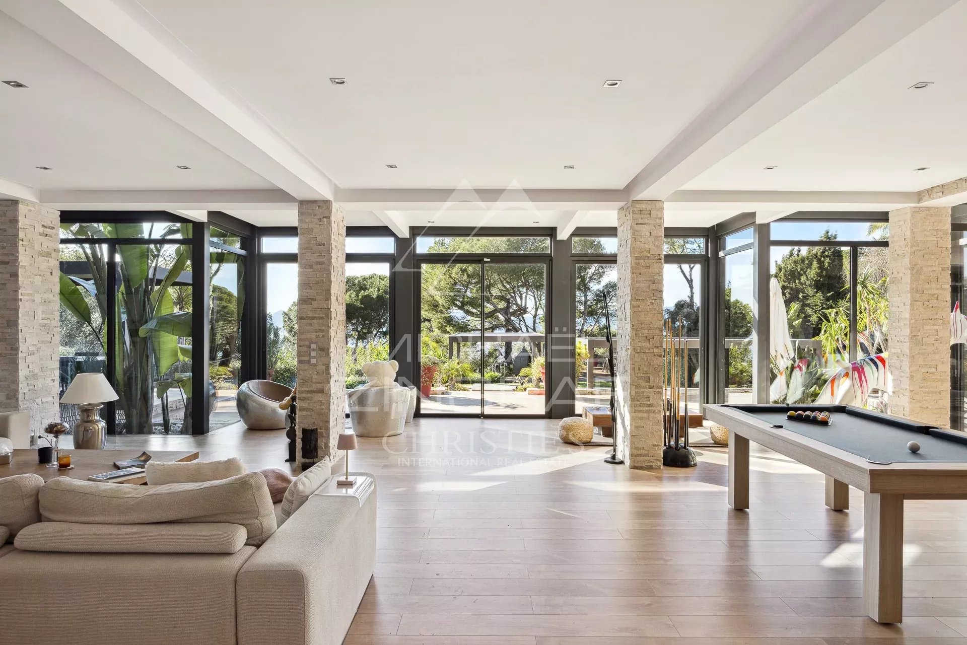 Interior of a property in Cannes Interior of a modern property in Cannes with sea views, bright living room and reception area.