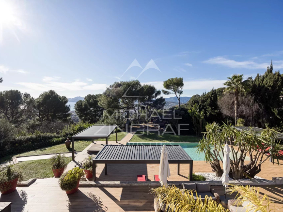 Panoramic sea views from a modern property in Cannes, with garden and swimming pool.