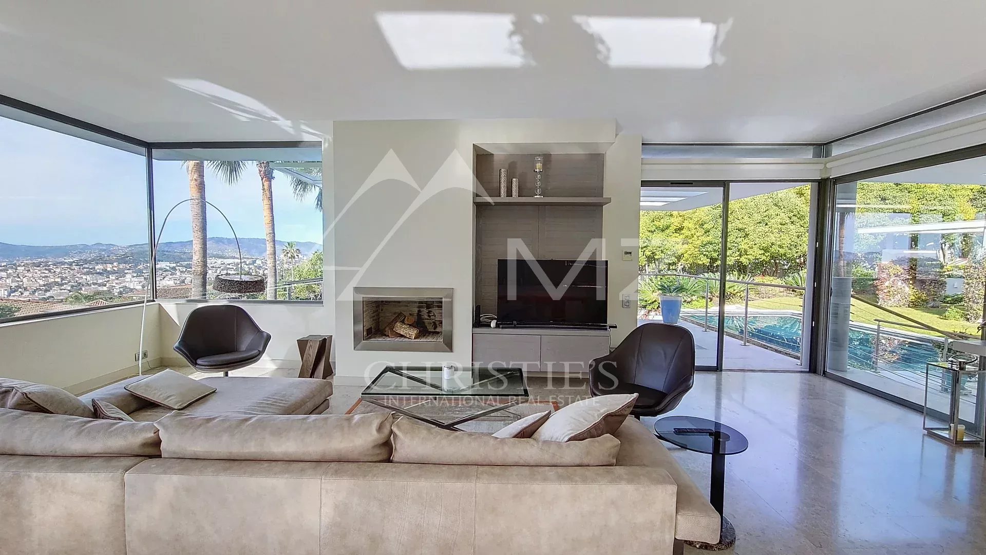 Contemporary villa in Cannes Interior of a contemporary villa in Cannes with sea views, bright and modern living room.