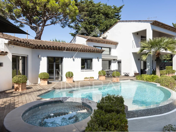 Modern villa with swimming pool and garden in Le Cannet, France.