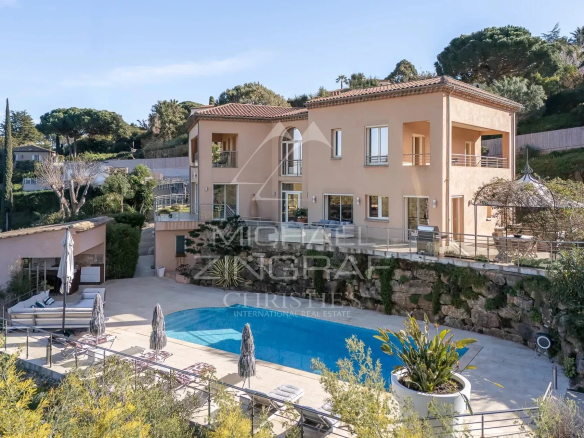 Modern villa with swimming pool and mountain views in Super-Cannes, Cannes.