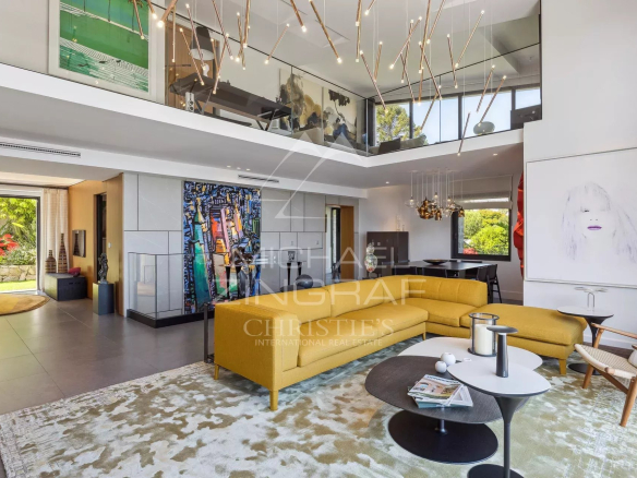 Interior of a modern villa in Cannes with a bright living room and contemporary decor.