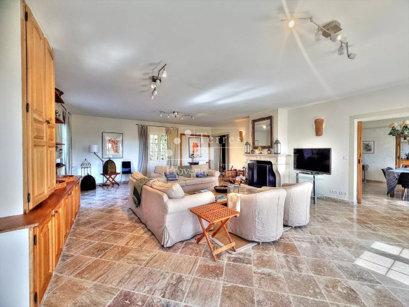 Interior of a Provençal country house with a spacious and bright living room.