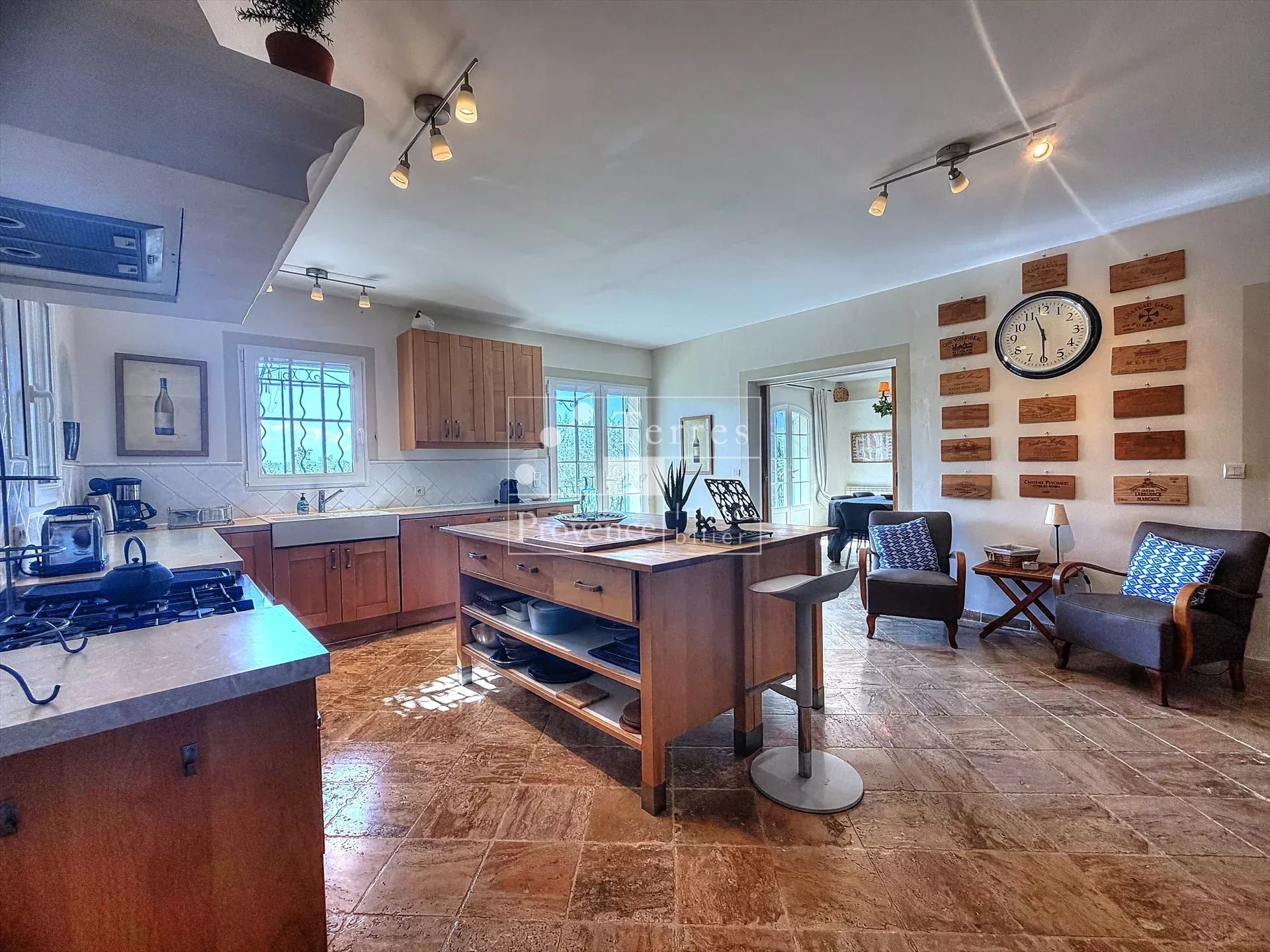 Interior of a country house in Lorgues Interior of a Provençal farmhouse with kitchen and living room, natural light