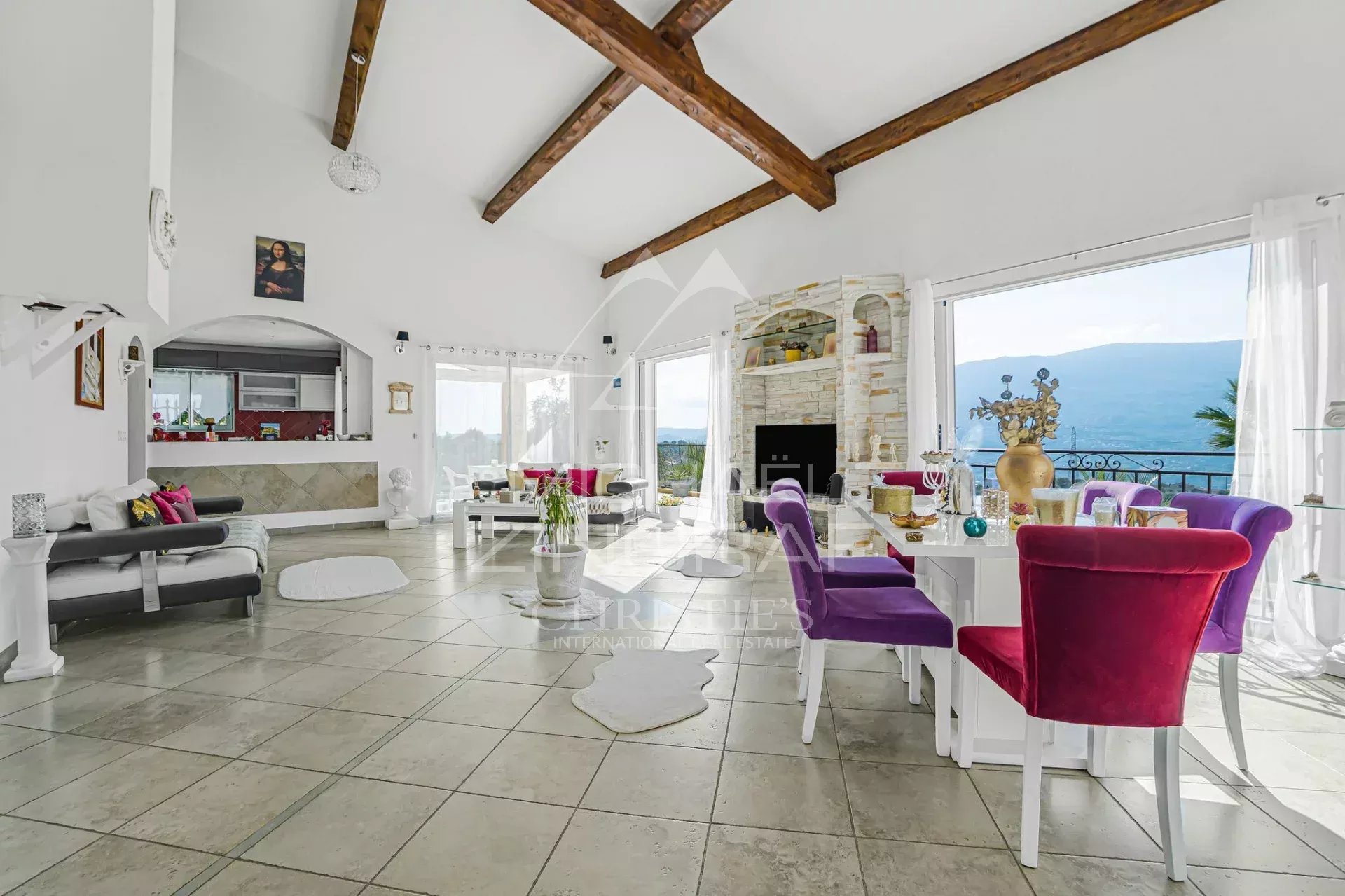 Bright interior of a property in Colomars Interior of a family property in Colomars with views of the hills, bright living room and modern furniture.