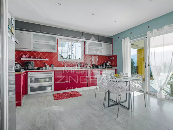 Modern and bright kitchen in a property in Colomars, with access to a terrace.