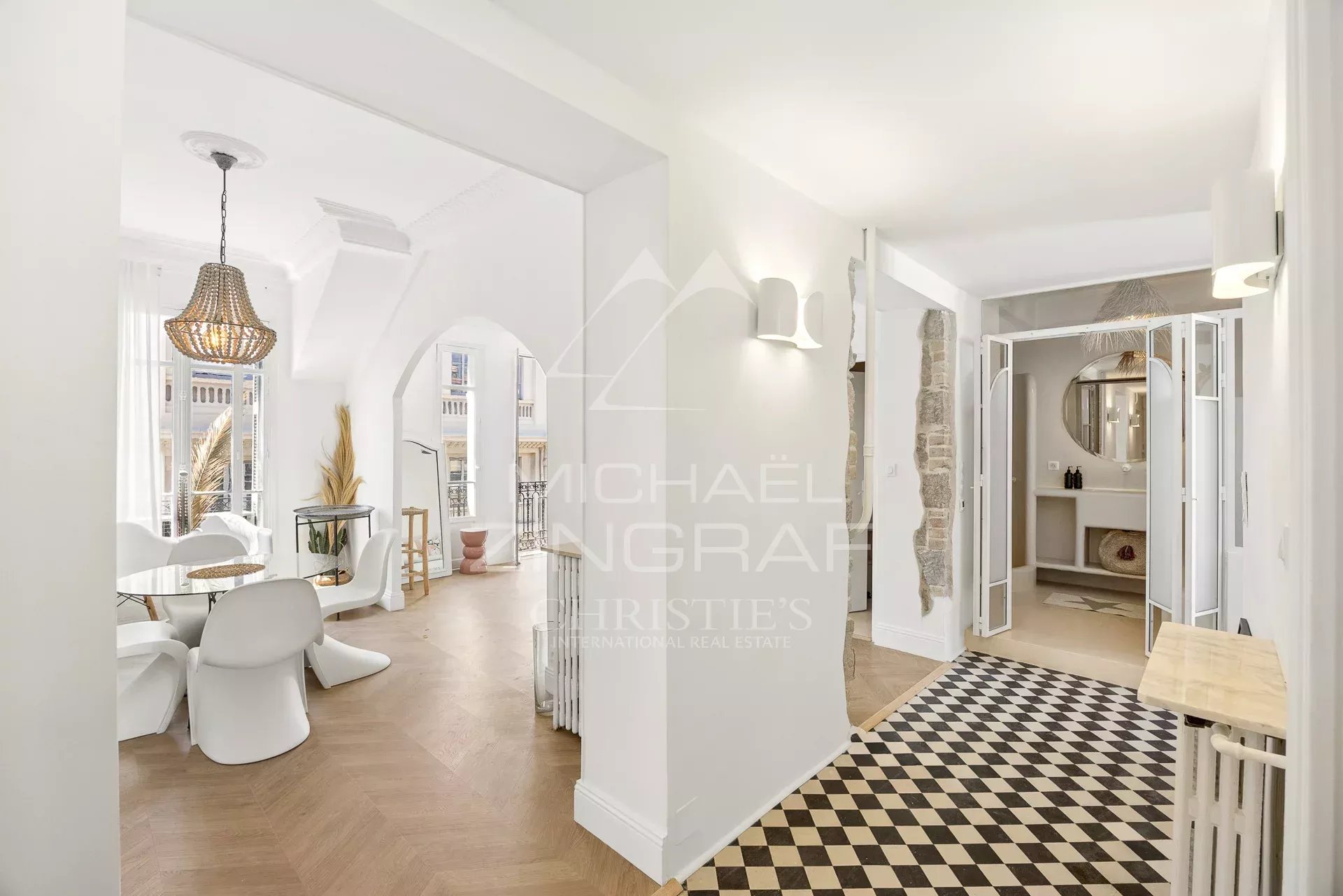 Interior of a top-floor apartment with a bohemian chic decor in Nice.