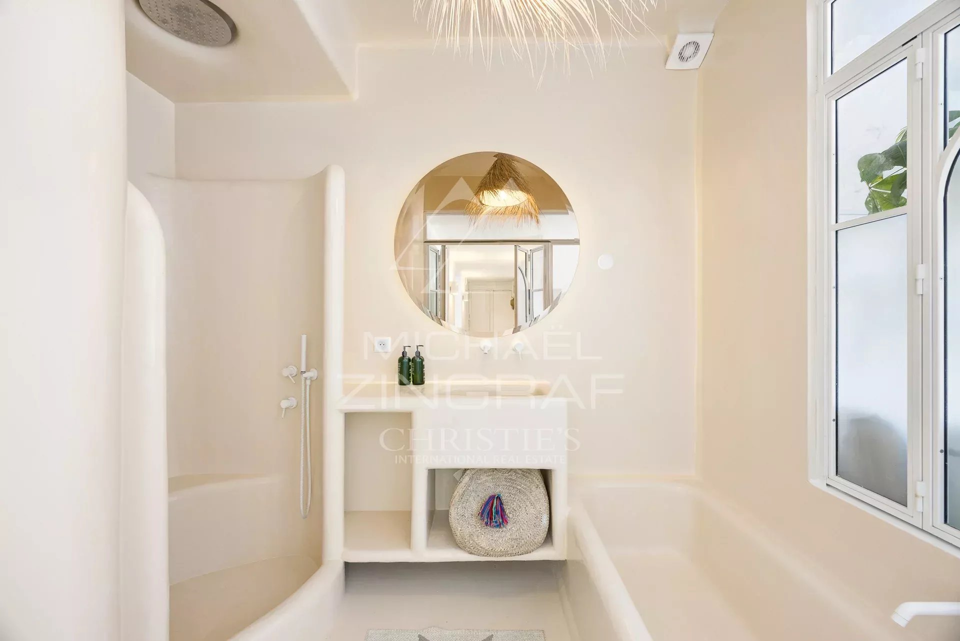 Modern bathroom with shower and bathtub, bohemian decor.