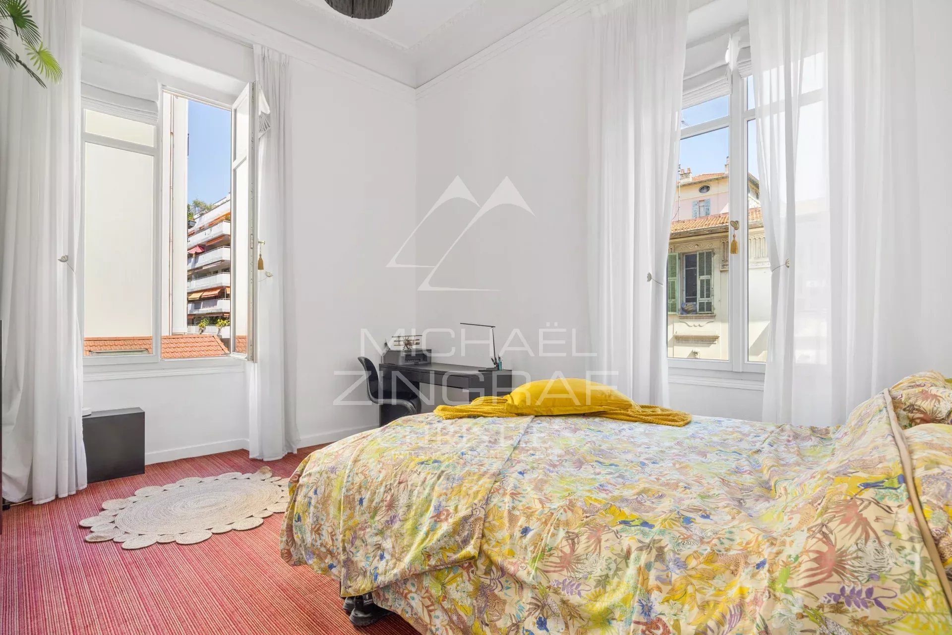 Apartment room in Nice Room in a Nice apartment with bright windows and colorful decor.