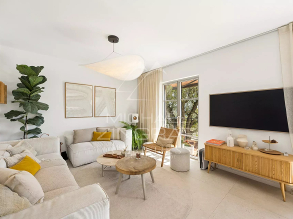 Interior of a renovated villa in Nice with a bright living room and modern decor.