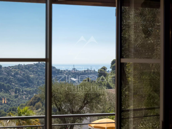 Unobstructed sea view from inside a renovated villa in Nice.