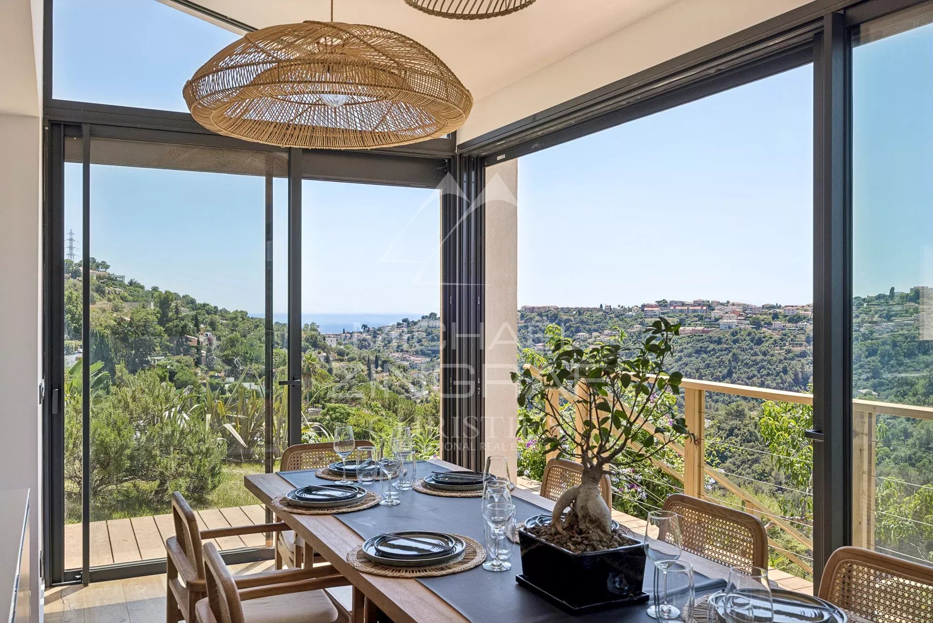 Dining room with a view in Nice Bright dining room with views of the hills and the sea in Nice.