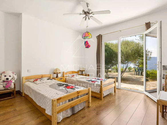 Children's room with wooden beds and view of the outside, Aspremont.