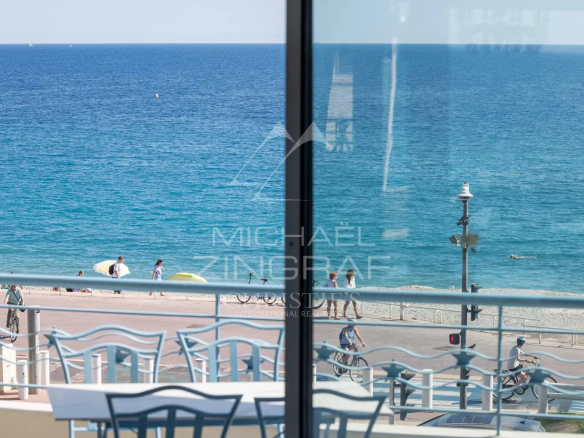 View of the Mediterranean Sea from an apartment in Nice, with the Promenade des Anglais in the foreground.