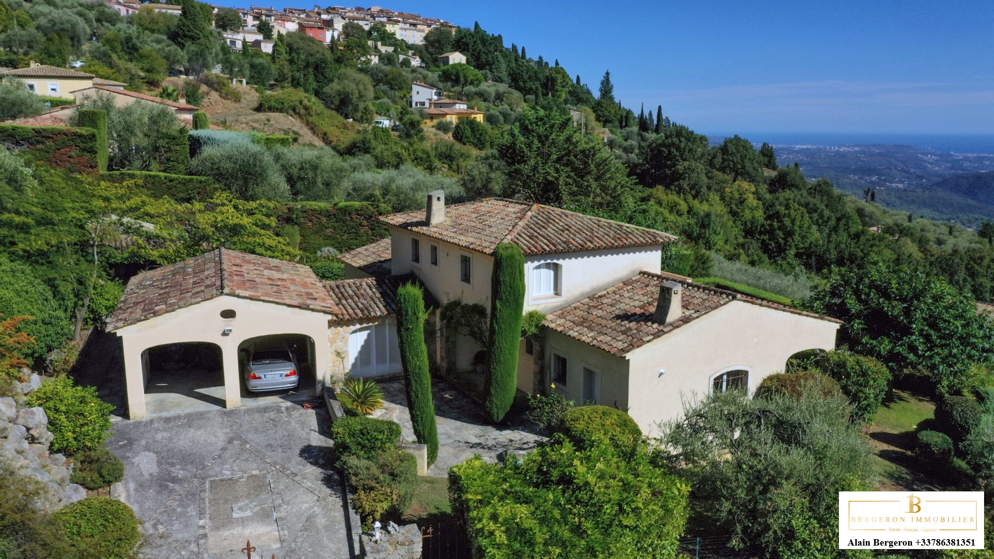 Luxury villa in Cabris Aerial view of a villa in Cabris, surrounded by greenery and hills.