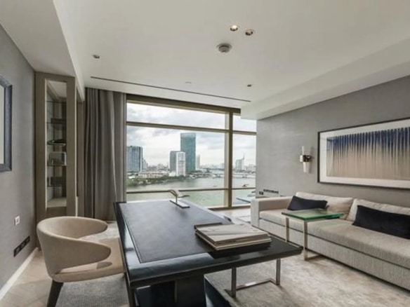 Interior of a luxury apartment in Bangkok with a view of the city.