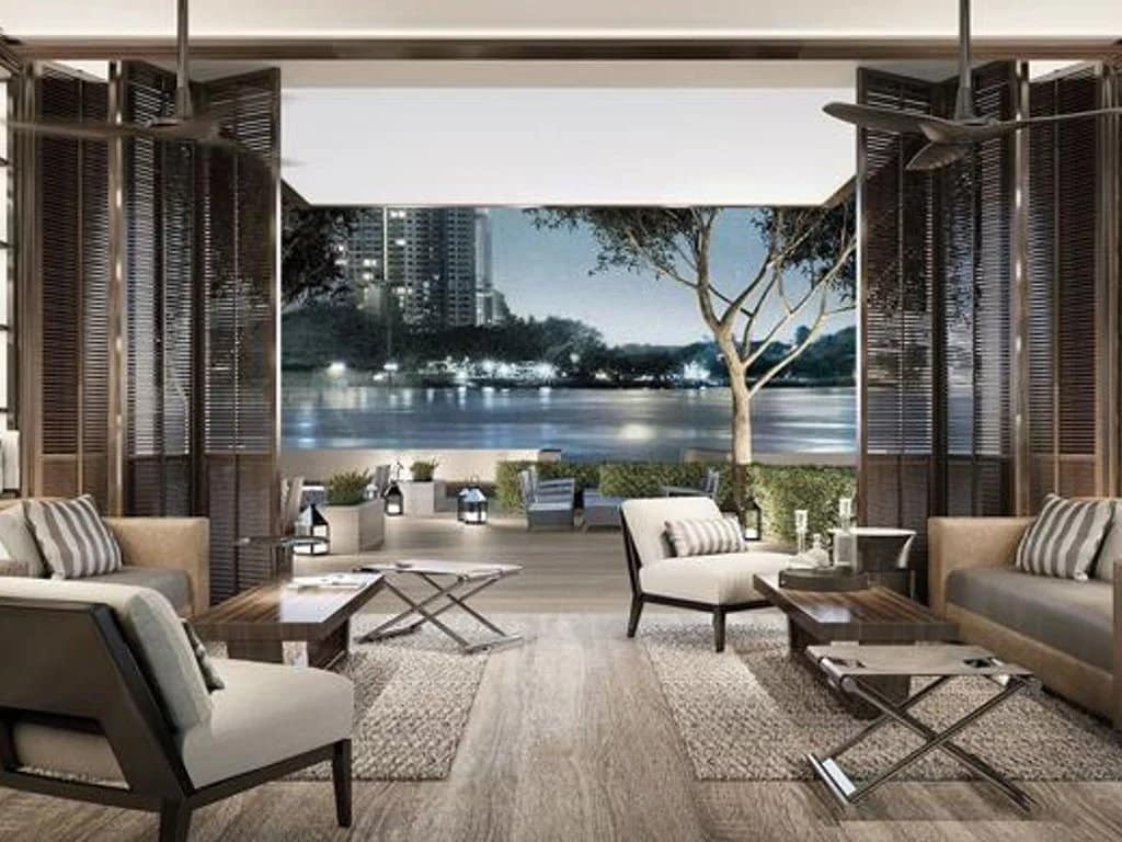 Interior of a luxury apartment with a modern living room and city view in Bangkok, Thailand.