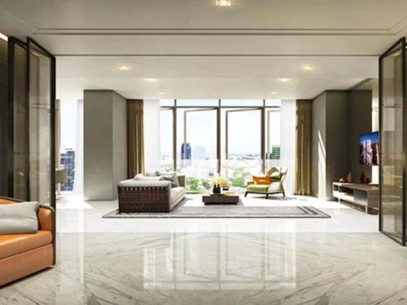Intérieur d'un appartement moderne à Bangkok avec un salon spacieux et une vue sur la ville.