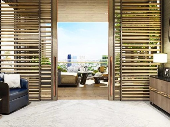 Interior of a modern apartment in Bangkok with city views from a balcony.