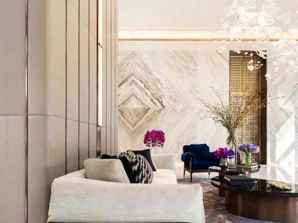 Interior of a luxury apartment in Bangkok with a modern living room and elegant decor.