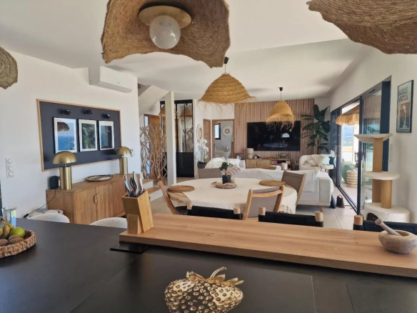 Interior of a modern villa with sea view, tastefully decorated, located in Sari-Solenzara.