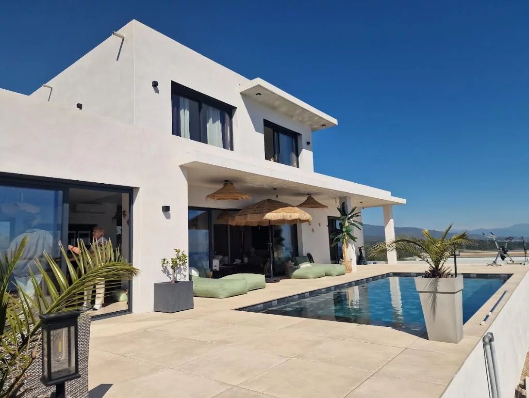 Exceptional property in Sari-Solenzara Modern villa with swimming pool and sea view in Sari-Solenzara, surrounded by greenery.