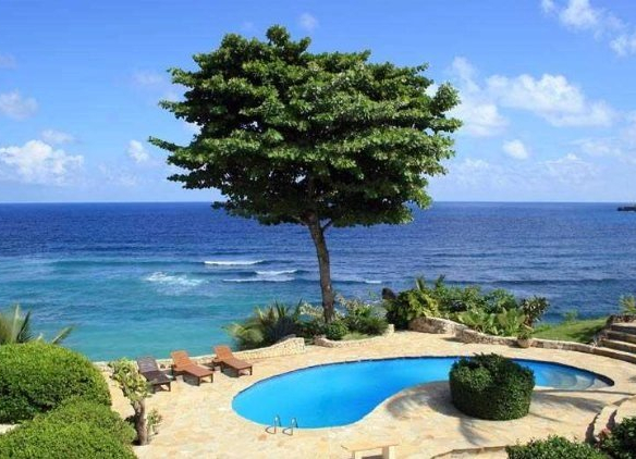 Amazing beachfront villa in Cabrera is located on a cliff in El Breton near Cabrera with fantastic ocean views.